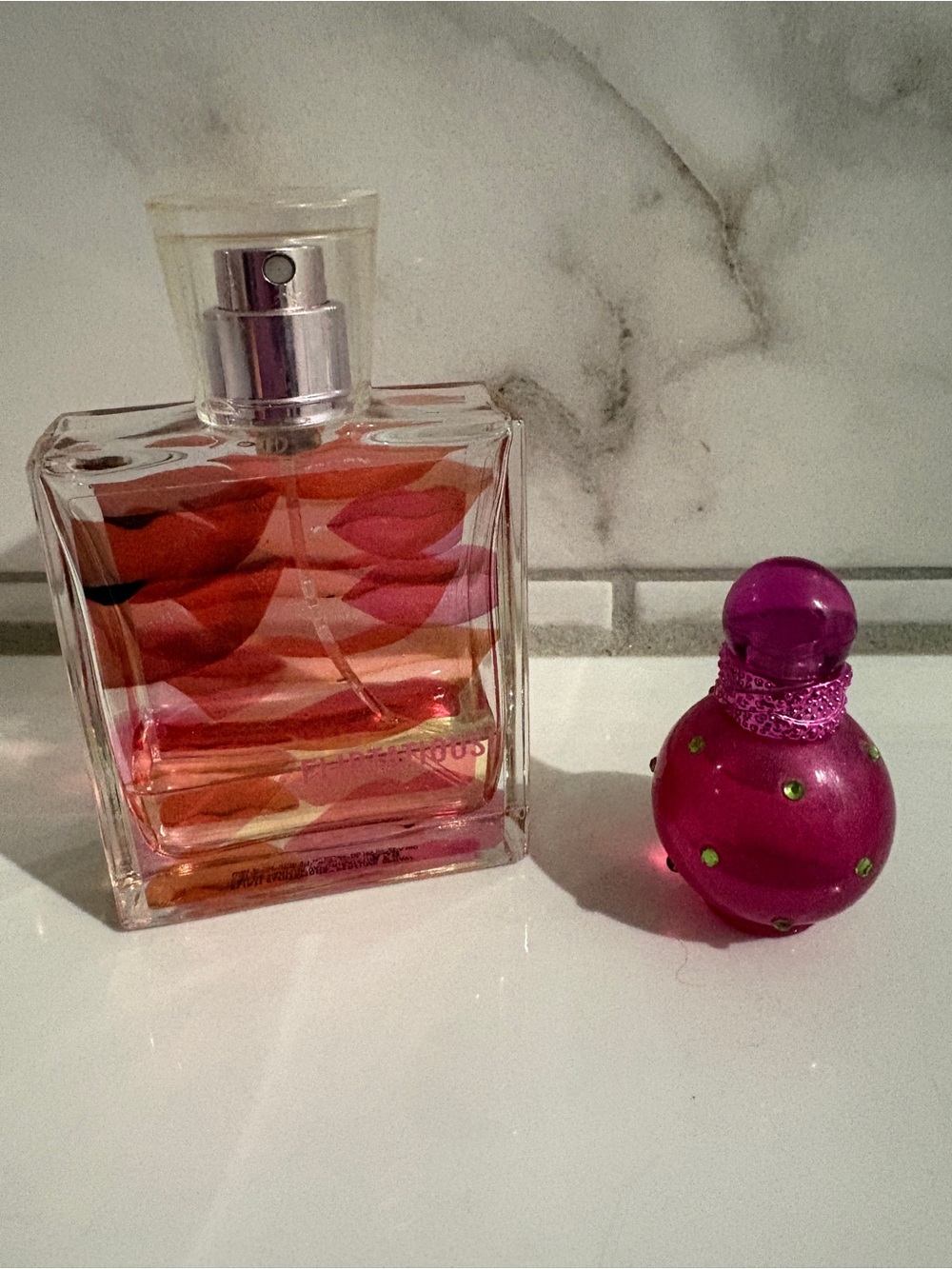 Fragrance bundle- Flirtatious 15% and Fantasy by Britney Spears 85% full